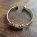 Verstellbares Armband mit Goldfarbene Anhängern