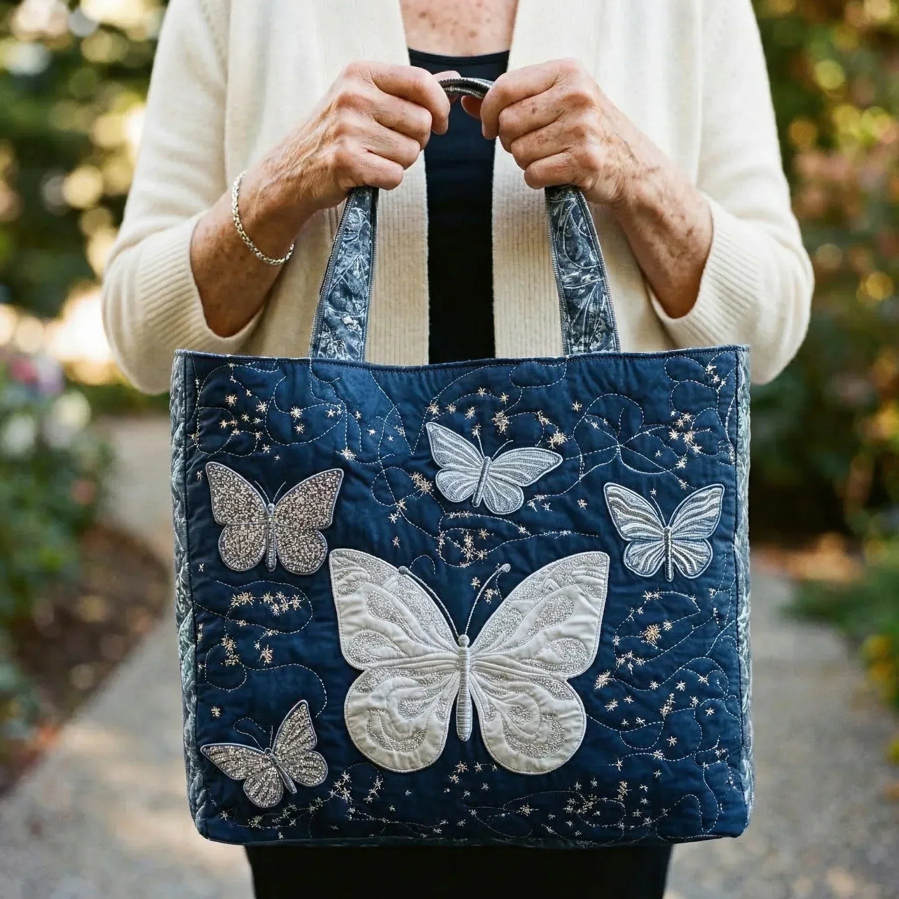Gesteppte Tasche - Silberner Schmetterling